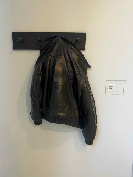 Brass scu;tprure showing a leather bomber jacket